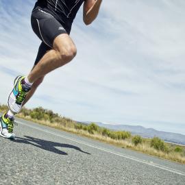 running guy on road